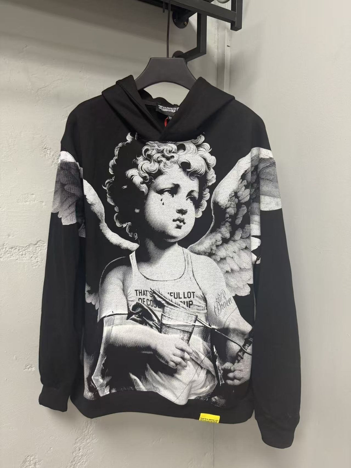 THAT'S A AWFUL LOT OF COUGH SYRUP Angel Tears Graphic Hoodie ¡ª front