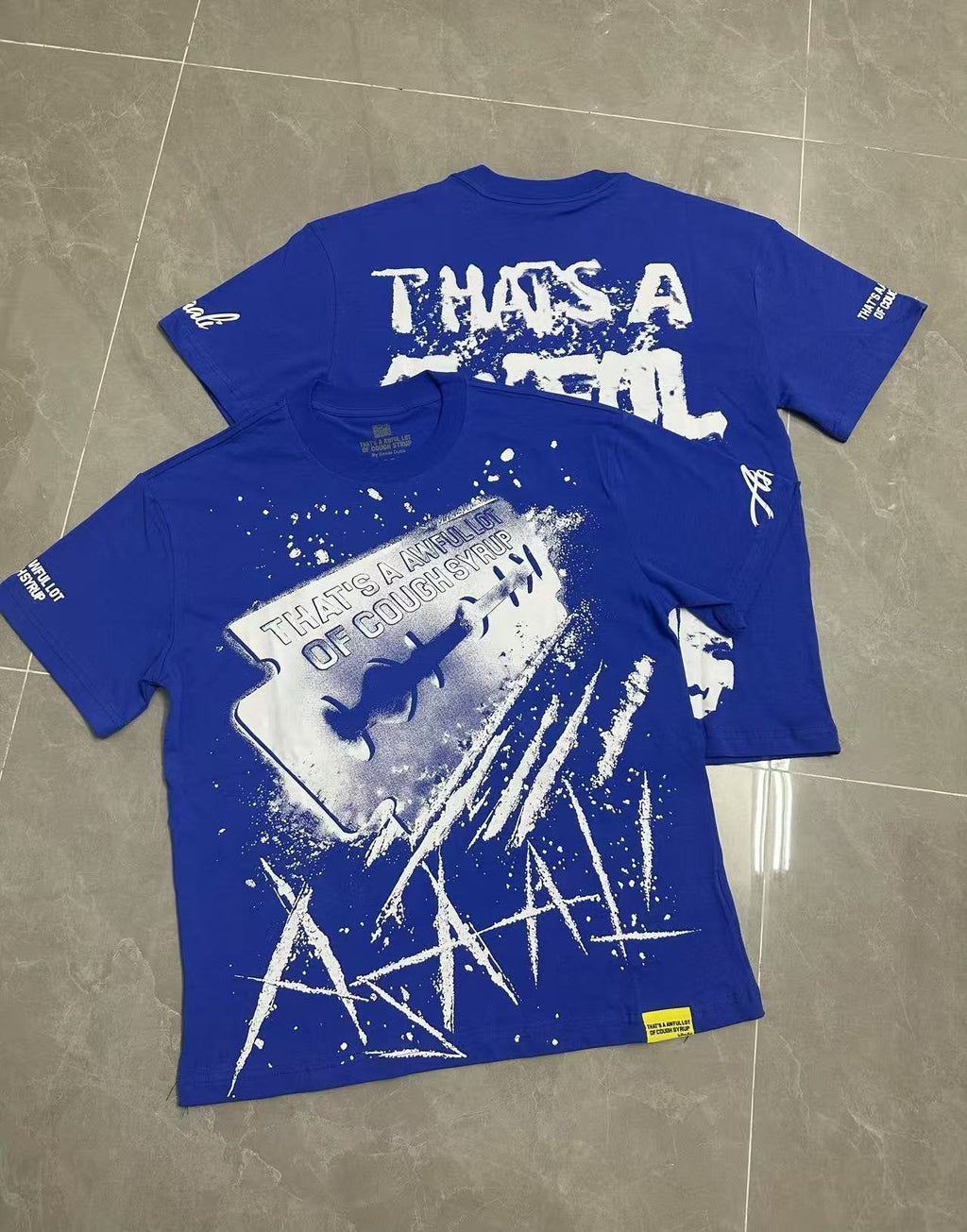 THAT'S A AWFUL LOT OF COUGH SYRUP Blue Graphic T-Shirt ¡ª context