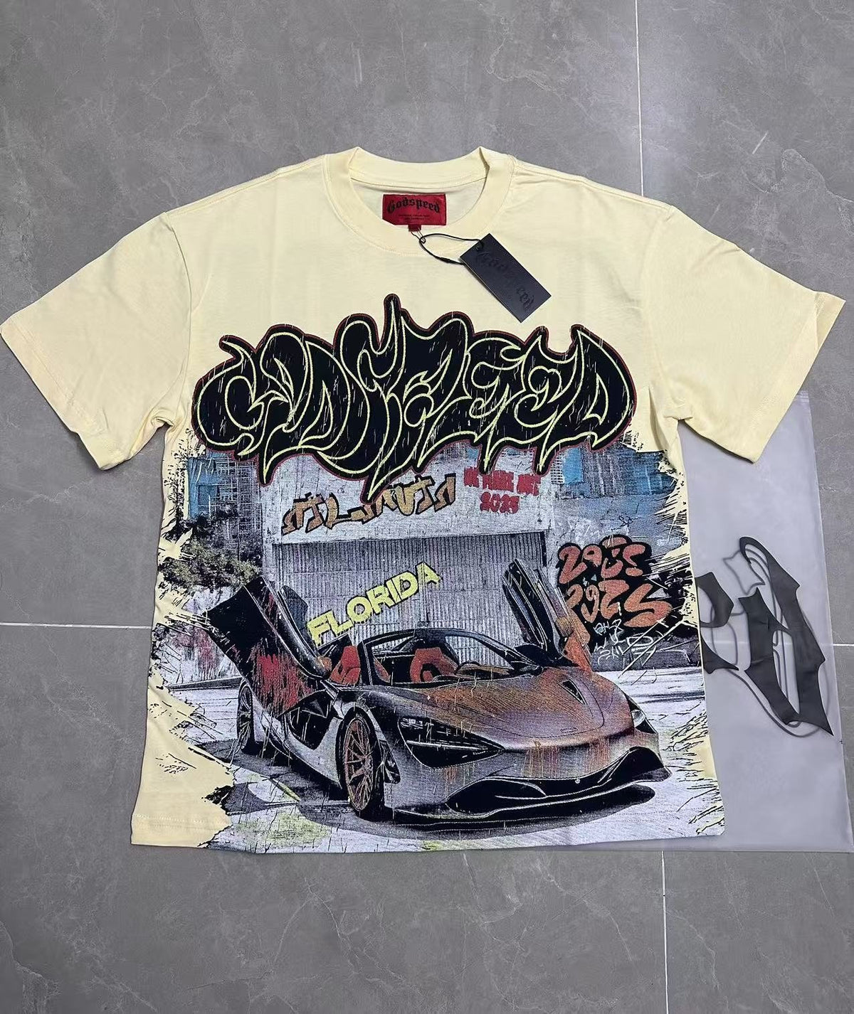Godspeed Out of Many One Car Graphic T-Shirt ¡ª context
