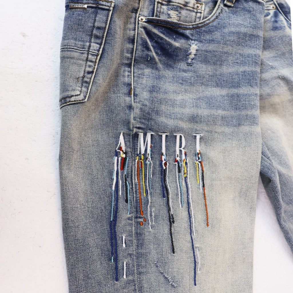 AMIRI Sinners Distressed Skinny Jeans ¡ª front