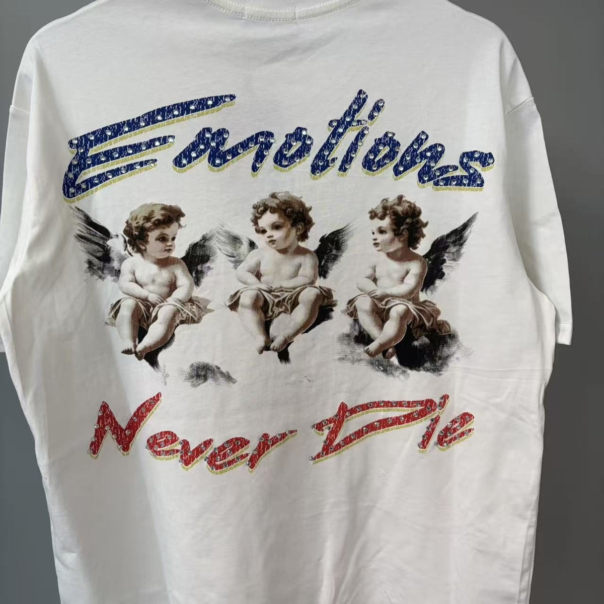 MIXED EMOTION Emotions Never Die Cherub Graphic T-Shirt ¡ª front