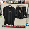 ESSENTIALS Three-Bar Graphic T-Shirt and Shorts Set ¡ª hero