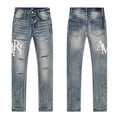 AMIRI Light Blue Distressed Letter Graphic Jeans ¡ª hero