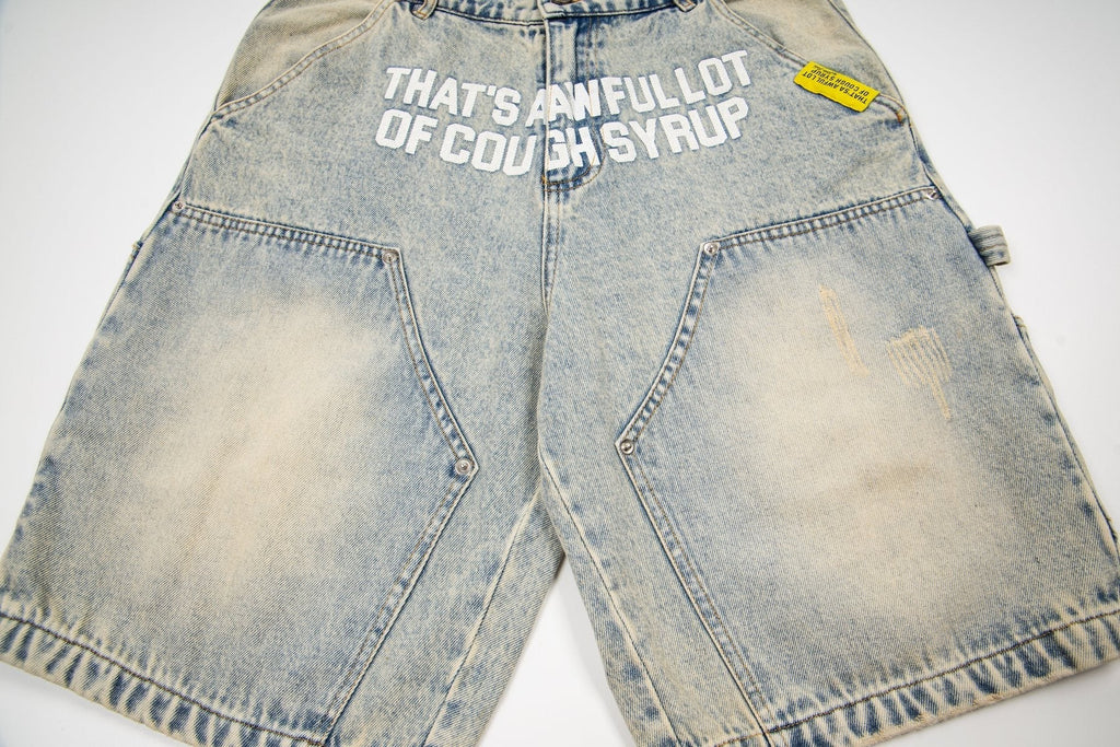 THAT'S A AWFUL LOT OF COUGH SYRUP Washed Denim Graphic Shorts ¡ª front