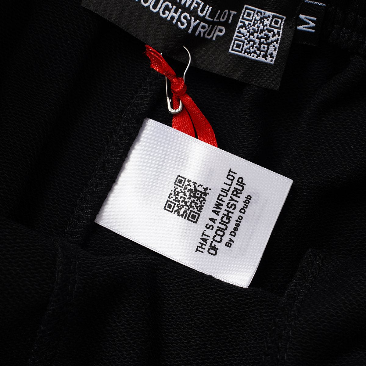 THAT'S A AWFUL LOT OF COUGH SYRUP Portrait Graphic Shorts ¡ª neck_label