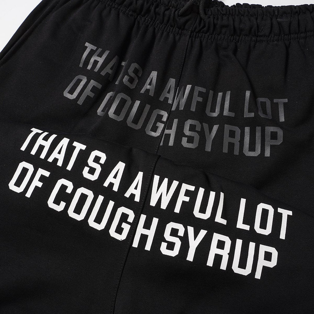 THAT'S A AWFUL LOT OF COUGH SYRUP Black Graphic Shorts ¡ª detail
