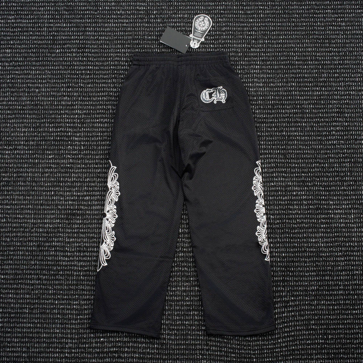 Chrome Hearts Sanskrit Cross Graphic Wide-Leg Pants ¡ª hero