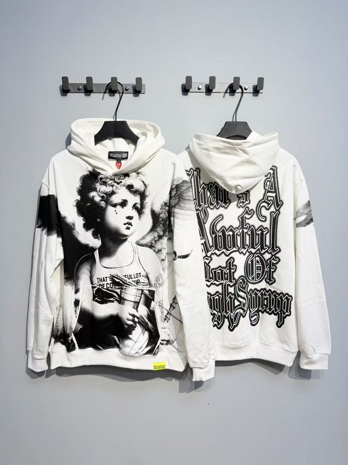 THAT'S A AWFUL LOT OF COUGH SYRUP Angel Graphic Hoodie ¡ª context